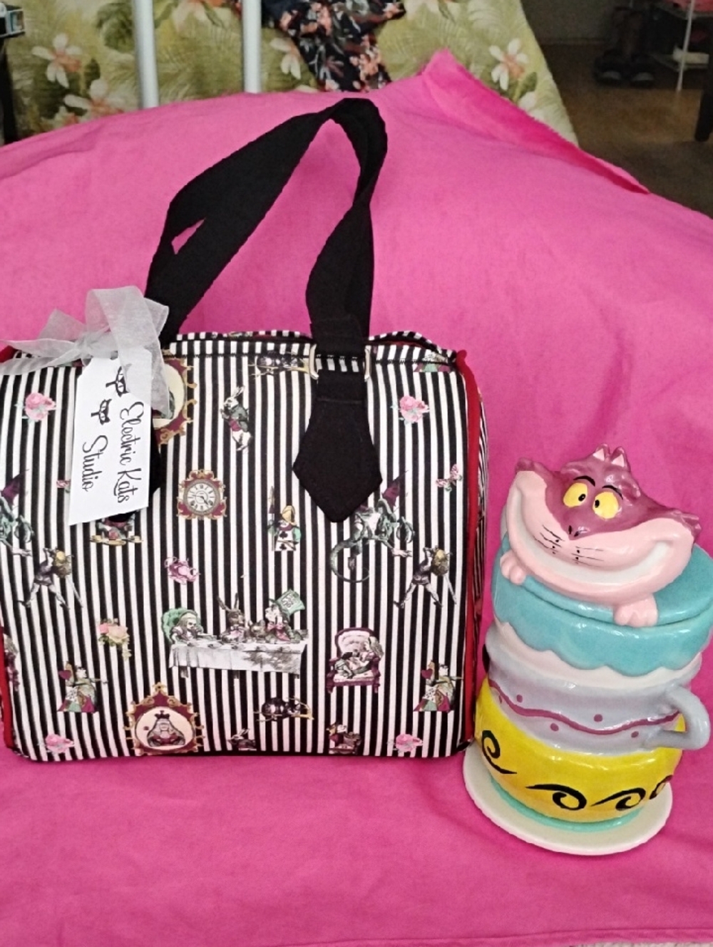 Gothic Alice In Wonderland Black & White Striped Hobo Bag with Pink Accents.